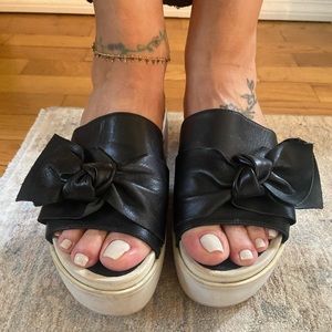 Shelly London slip on sandals with the cutest bow on-top